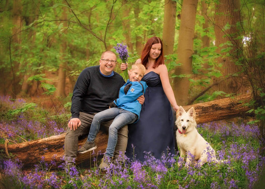 Nottingham Family Photoshoot - Family with Dog Among Bluebells during Bluebells Season.