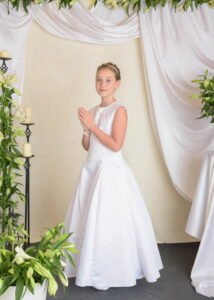 Formal First Holy Communion Photography in studio with elegant white dress
