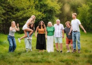 Group of friends and family in a Nottinghamshire field during a best friends and family photoshoot