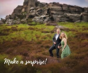 Couple walking on moorland in Nottingham during anniversary photography session