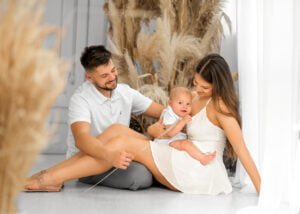 Family sitting together during a relaxed family photography session by a professional family photographer.