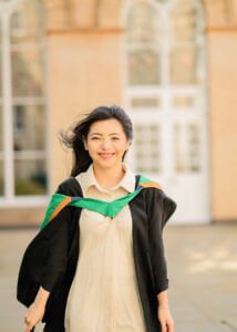 A celebratory graduation portrait captured at Nottingham University by Nottingham Family Photographer showcases a big milestone in an individual's academic journey.
