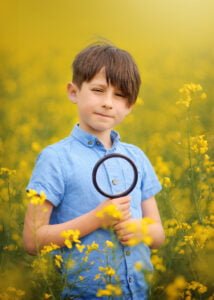 portrait of a boy on a rapeseed field, Children Family Portrait Photographer in Nottingham, Eastwood