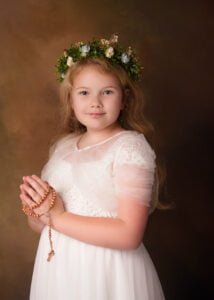 Studio portrait of girl holding rosary during First Holy Communion Photography