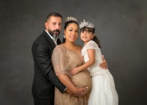 Elegant family portrait with crowns captured by a maternity photographer in Nottingham.