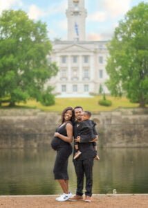 Outdoor maternity photoshoot in Nottingham with family by the lake