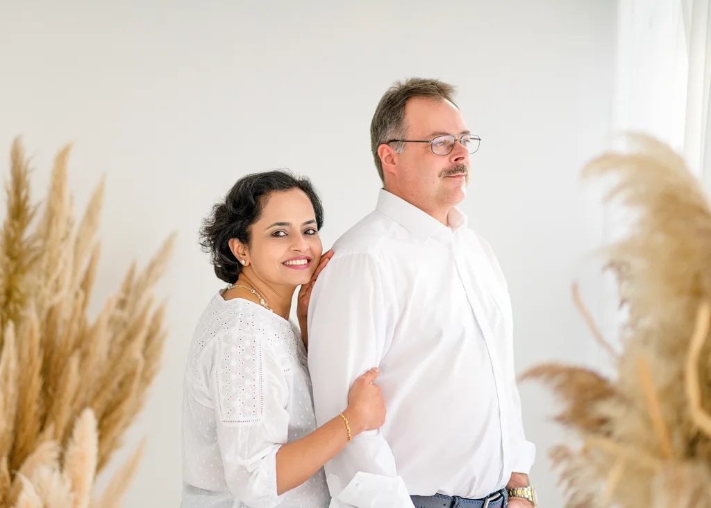 professional couple photoshoot in studio, white theme