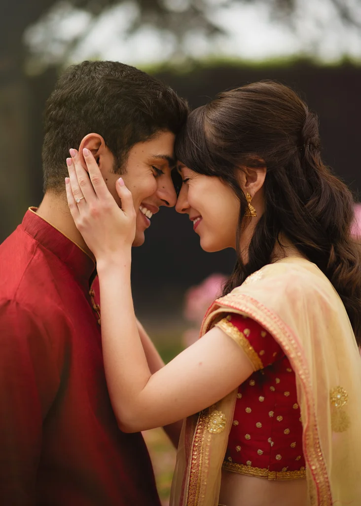 indie couple engagement portrait, red and golden colours