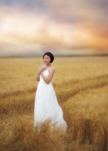Soft empire-style white gown for studio or outdoor photoshoots