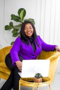 Businesswoman in lifestyle setting during branding photoshoot, showcasing authenticity and everyday life, representing a business coach