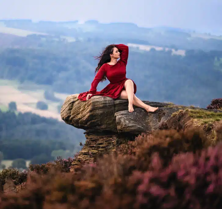 Fine Art Portrait of a Nottingham Family Photographer in Red Dress at Peak District