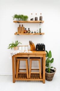 Handmade wooden shelves with decor items and plants, photographed with high-quality lighting for product photography in Nottingham.