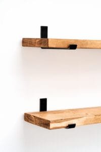 Close-up of wooden shelf bracket, capturing craftsmanship and texture in Nottingham product photography studio.