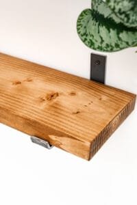 Close-up of wooden shelf bracket and grain, photographed in Nottingham product photography studio.