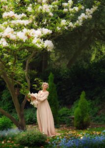 Woman in blush maternity robe dress during Nottingham photoshoot