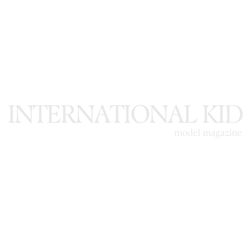 International Kid Model Magazine featured logo displayed on Nottingham Family Photographer website highlighting published children and family photography work.