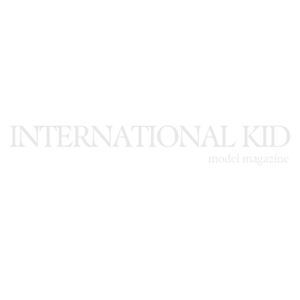 International Kid Model Magazine featured logo displayed on Nottingham Family Photographer website highlighting published children and family photography work.
