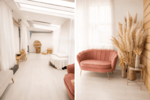 Bright natural light photography studio in Eastwood Nottingham with neutral interiors, white curtains, soft seating area and styling props for family, maternity and portrait photography sessions.