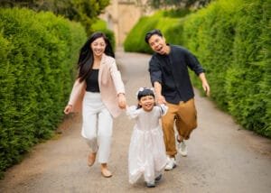 Family enjoying an outdoor family photography session in Nottingham